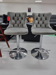 Velvet Stud Barstool with Footrest and Chromed Base- Gray. Price for Each floor stock only left